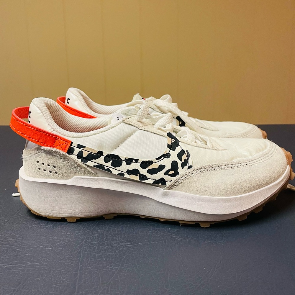 Nike Women's Cream White Sneakers with Black Leopard Swoosh and Orange Heel Tab